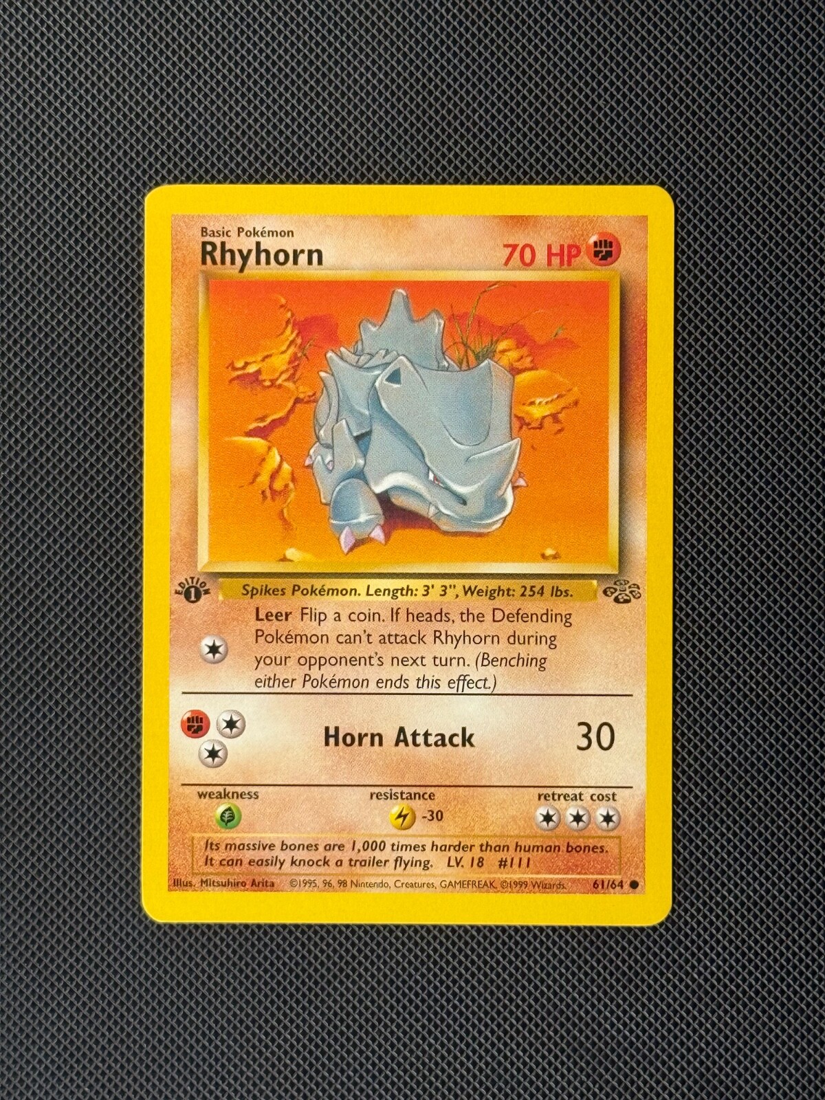 Rhyhorn 61/64 1st Edition Pokémon Card Jungle Common WOTC NM