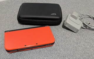 Nintendo 'new' 3DS XL Orange & Black Model with Case & Charger
