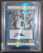 Jaycee Horn #SSA-JHO - 2024 Panini Photogenic Snapshot - Gold Auto 1/5 Bookend!