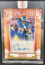 2025 Donruss Elite #PTTSD-RAM Puka Nacua Passing The Torch Nacua/Holt /25