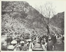 PHOTO OF MIGRANTS IN DESERT FROM NEGATIVE ON PHOTO PAPER