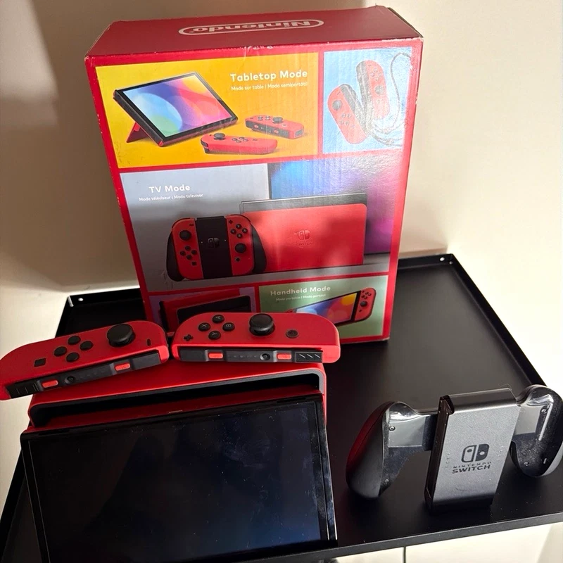 Nintendo Switch OLED 64GB console with red Joy-Con and dock