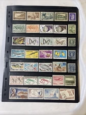Lot of new and used stamps from all over the world mostly  are off paper.