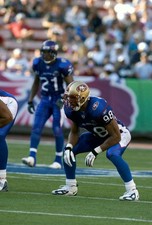 Julian Peterson NFC in action v the AFC at the NFL Pro Bowl Game o- 2004 Photo 1