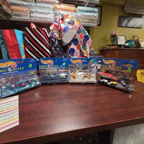 Vtg Hot Wheels Planet Micro Sets (4 In Total)