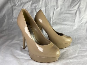 tan patent leather pumps