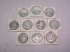Lot of 10 - 1963 CANADIAN SILVER DOLLARS