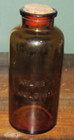 Antique “Milk’s Emulsion” Amber Bottle with Cork 8 1/4" Tall "B" on Bottom — photo 1