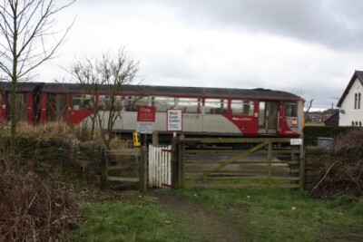 Photo 6x4 Level Crossing near Howley Mill Lane Batley A local stopping tr c2009