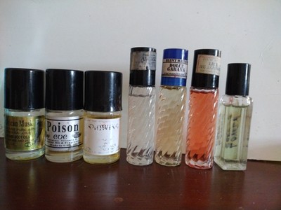 7 LOT OF BODY OIL DIFFERENT SCENTS PLEASE READ DESCRIPTION