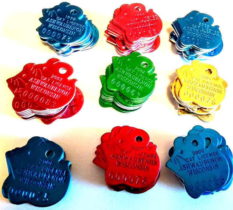Lot of 90 vintage metal cat license tags