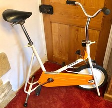 Exercise bike with adjustable new saddle, tension resistance wheel & mileometer