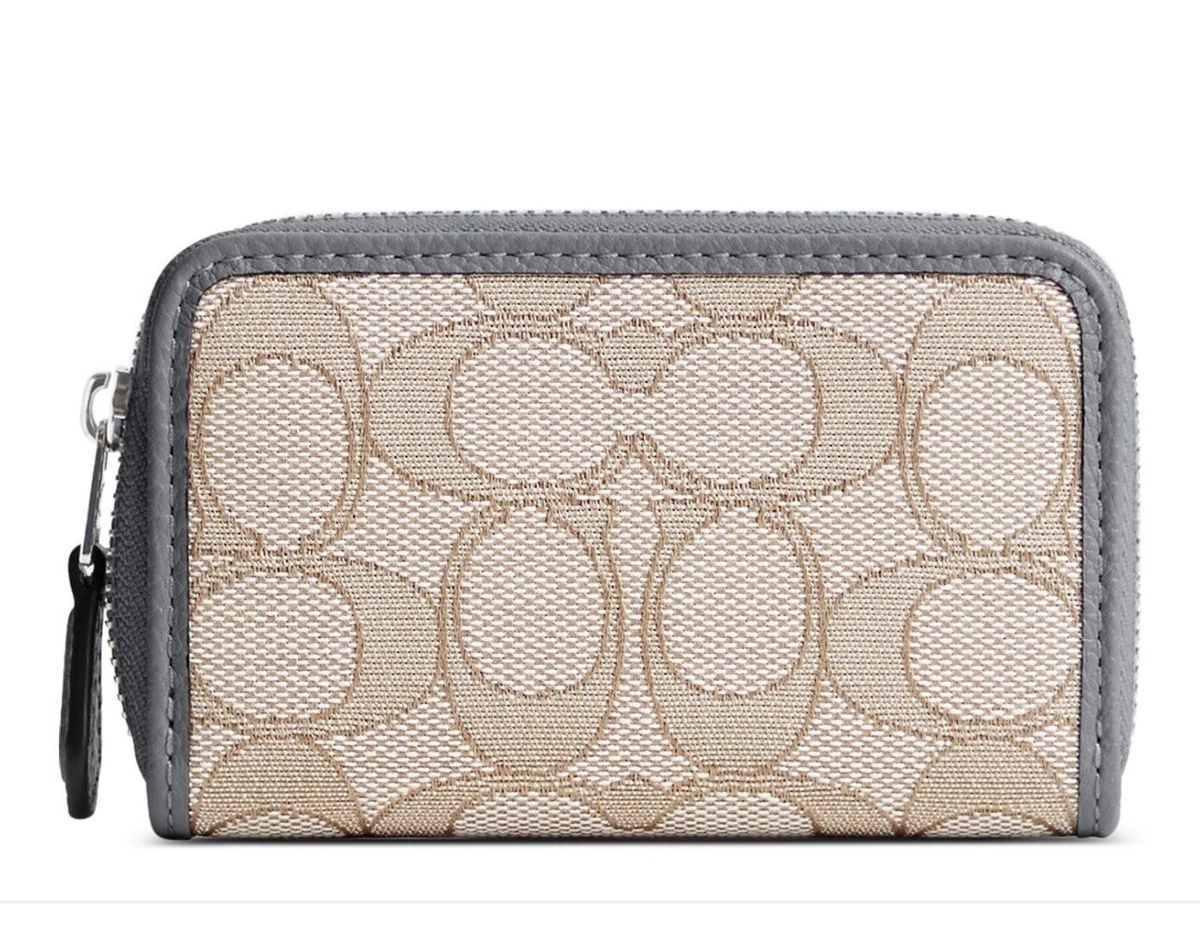 Coach zip clearance around coin case
