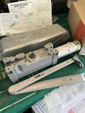 LCN 4011 door closer RH ALUM. 689 REG. Screw Pack Missing And Very Weather Box