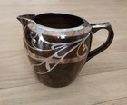 Art Nouveau ceramic brown glaze pottery creamer with art nouveau silver overlay — photo 1