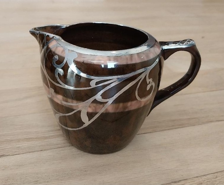 Art Nouveau ceramic brown glaze pottery creamer with art nouveau silver overlay
