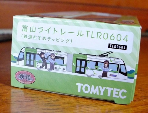 Tomytec N gauge TLR0604 Toyama Portram tram Anime conductors green doors livery - Picture 11 of 12