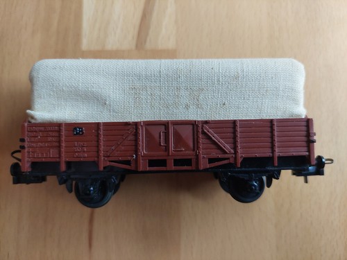 TRIX H0-Güterwagen der DB mit Abdeckplane 3452 (Bauart Omm Linz) | Condition: Gebraucht