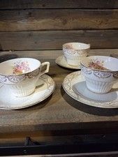 Vtg Set Of Three Cream With Floral And Gold Trim And Design Tea Cups Saucers