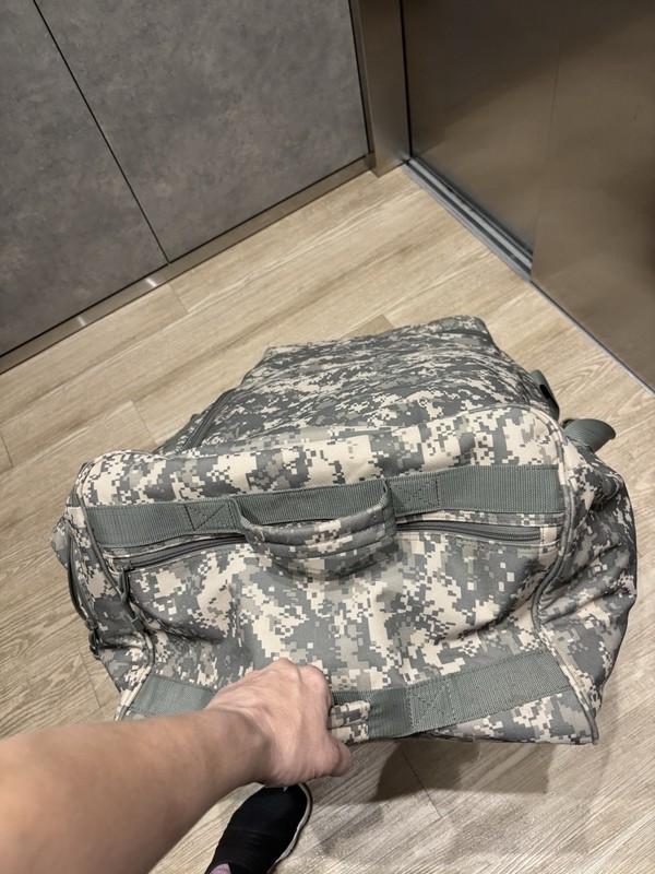 Mercury Mini Monster Rolling Duffle Bag