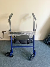 Blue McKesson / Drive Medical Folding Rollator Walker with Seat and Storage 
