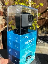GoPro hero 7 silver - 128gb SD Card - almost as ne w. Many many accessories! 
