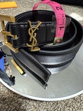 Belt with monogram of the Saint Laurent brand, characterized by its buckle 1  