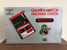 ebay® Auktion 366313082875 | Nintendo Game & Watch Panorama Mario’s Bombs Away TB-94 OVP komplett 1983 Thumbnail of ebay® auction 366313082875 | Nintendo Game & Watch Panorama Mario’s Bombs Away TB-94 OVP komplett 1983