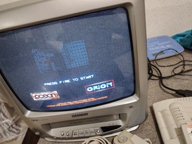 Console GX 4000 - Amstrad GX4000 2 manettes et 2 Jeux burning rubber Robocop 2