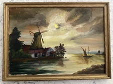 VINTAGE FRAMED OIL PAINTING - EUROPEAN STYLE WINDMILL NEAR BODY OF WATER