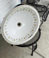 Kohler Vintage Fleur di lis sink. Oval Inside dimensions 17 x 14 .