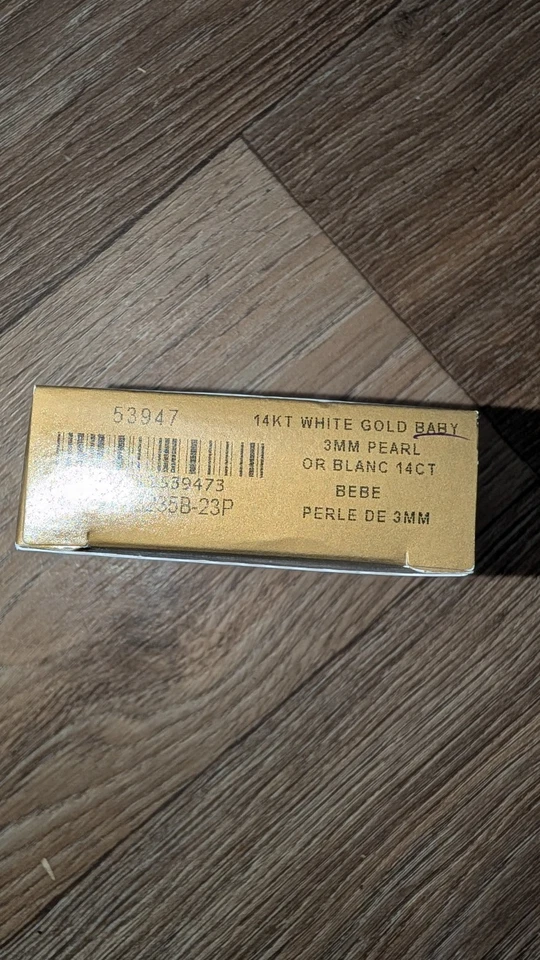 Sistema de perforación de oreja Studex de perlas genuinas para bebé de oro blanco de 14kt Foto 2 de 3