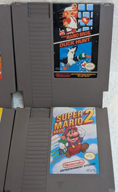 Lot of 4 Nintendo NES Mario Games, Super M 2 & 3, Dr. Mario, and M Bros Duck H.