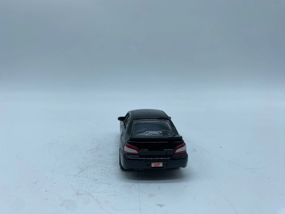 MODELLINO AUTO SUBARU IMPREZA WRX STI NERA - BURAGO - SCALA 1:43 NO BOX - Immagine 3 di 4