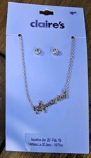 Claire s Girls Zodiac Astrological Symbol Necklace Aquarius Studded Earrings