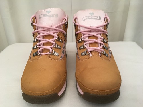 tan and pink timberlands