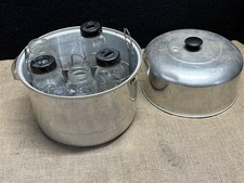 vintage Evenflo baby bottle sterilizer / warmer, with some glass bottles