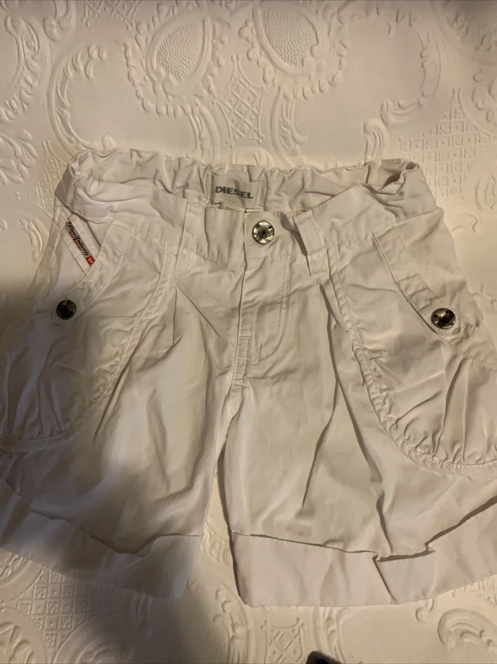 Falda y corta Diesel de segunda mano para niña talla 4 y 5 Foto 2 de 4