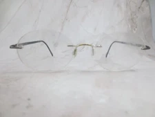 Marchon Airlock2 Eyeglasses Frame 770 034 Women's Silver Metal Oval Rimless 140