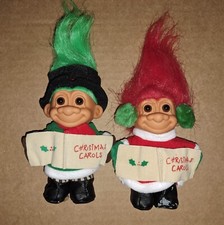 A pair of Russ Troll Christmas Carolers