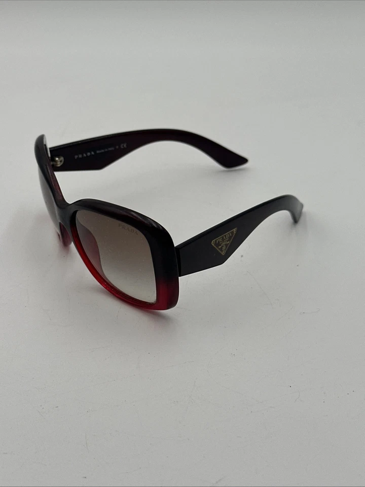 Gafas de sol Prada SPR 32P rojas y negras para mujer auténticas hechas en Italia  Foto 2 de 4