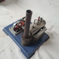 Original vintage wilesco stationary steam engine mounted on blue metal base