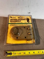 Belwith interlocking surface mount deadbolt / rim lock