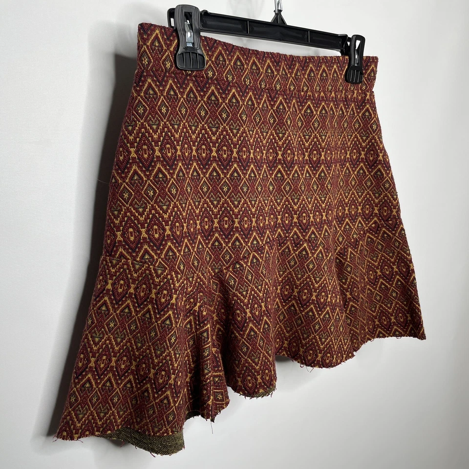 Minifalda Free People When In Rome talla M roja dorada geométrica acampanada Foto 2 de 4