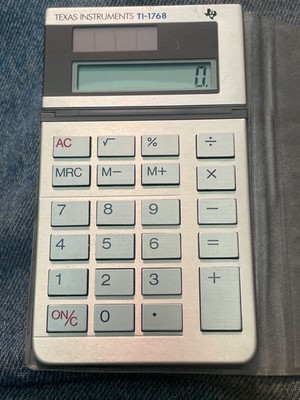 Vintage Texas Instruments TI-1768 Mini Compact Pocket Solar Calculator TESTED 