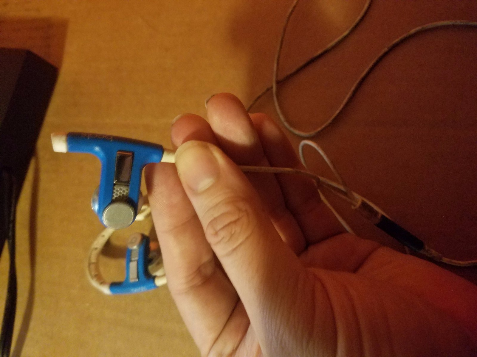 PowerBeats by Dr. Dre Ear Hook Earphones in Neon Blue and White Broken