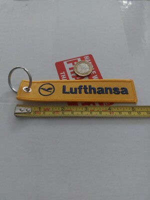 Schlüsselanhänger Lufthansa Deutschland nationale Fluggesellschaft gelb & blau doppelseitig Nylon neu in Verpackung