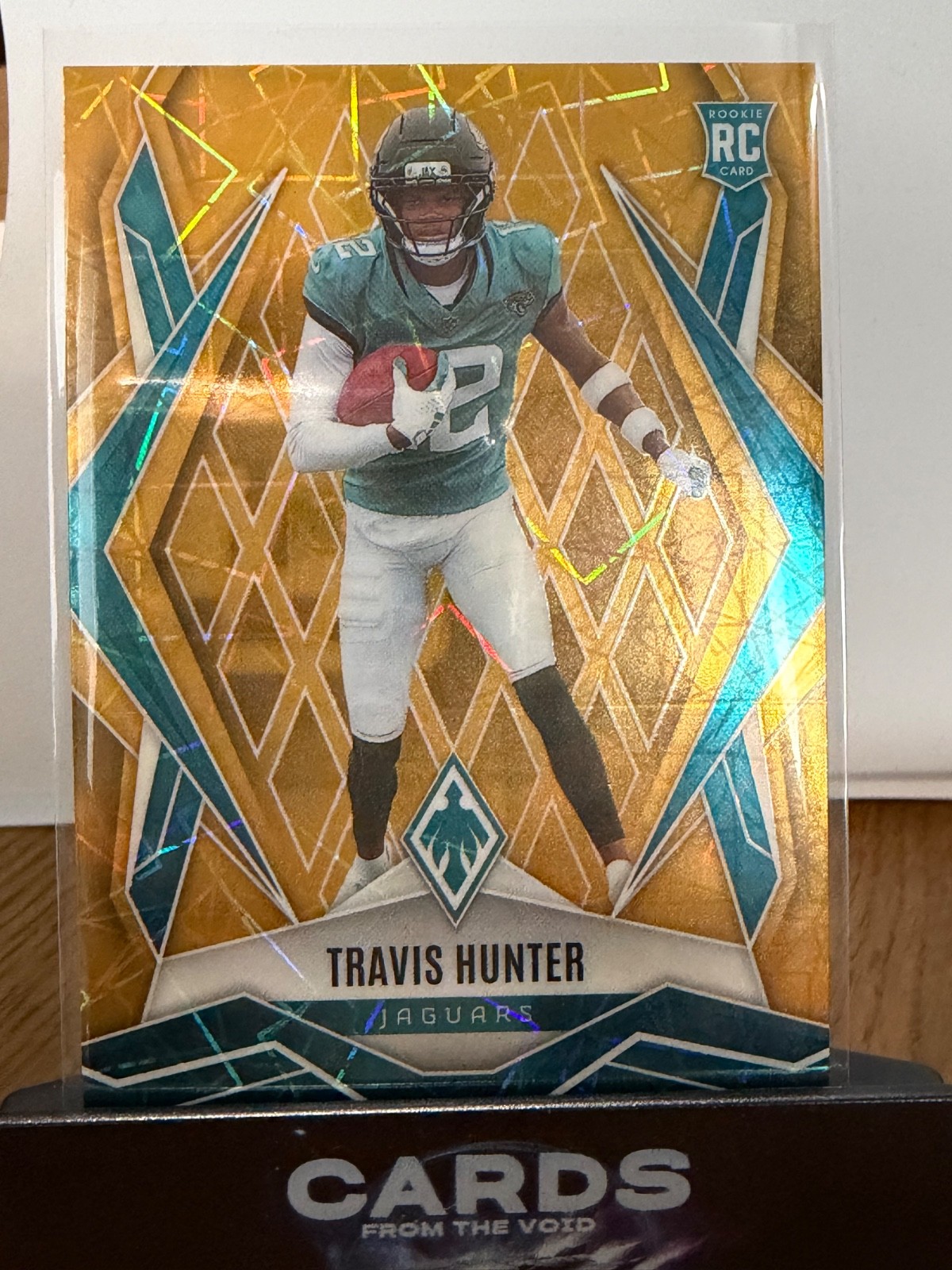 2025 Panini Phoenix -  Travis Hunter #157 Gold (RC) /10