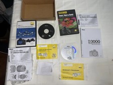 Various Manuals And Discs For Nikon Camera