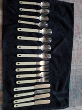 Vintage Northland Stainless cutlery set cream plastic handles Japan